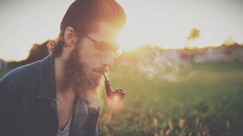 man smoking pipe - life insurance for smokers