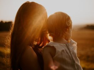 mother child sunset image - life insurance for stay at home parent