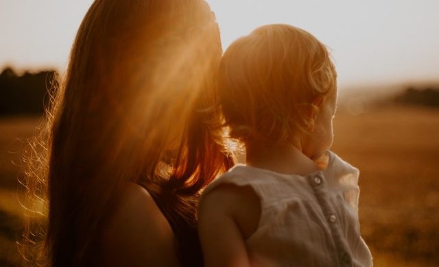 mother child sunset image - life insurance for stay at home parent