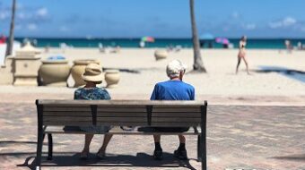 social security election options - retired beach couple image