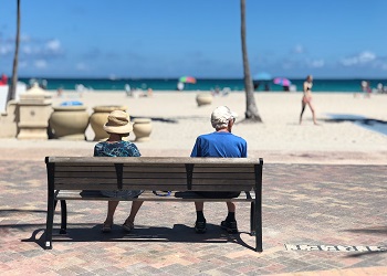 social security election options - retired beach couple image