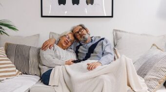 required minimum distributions - couple on sofa image
